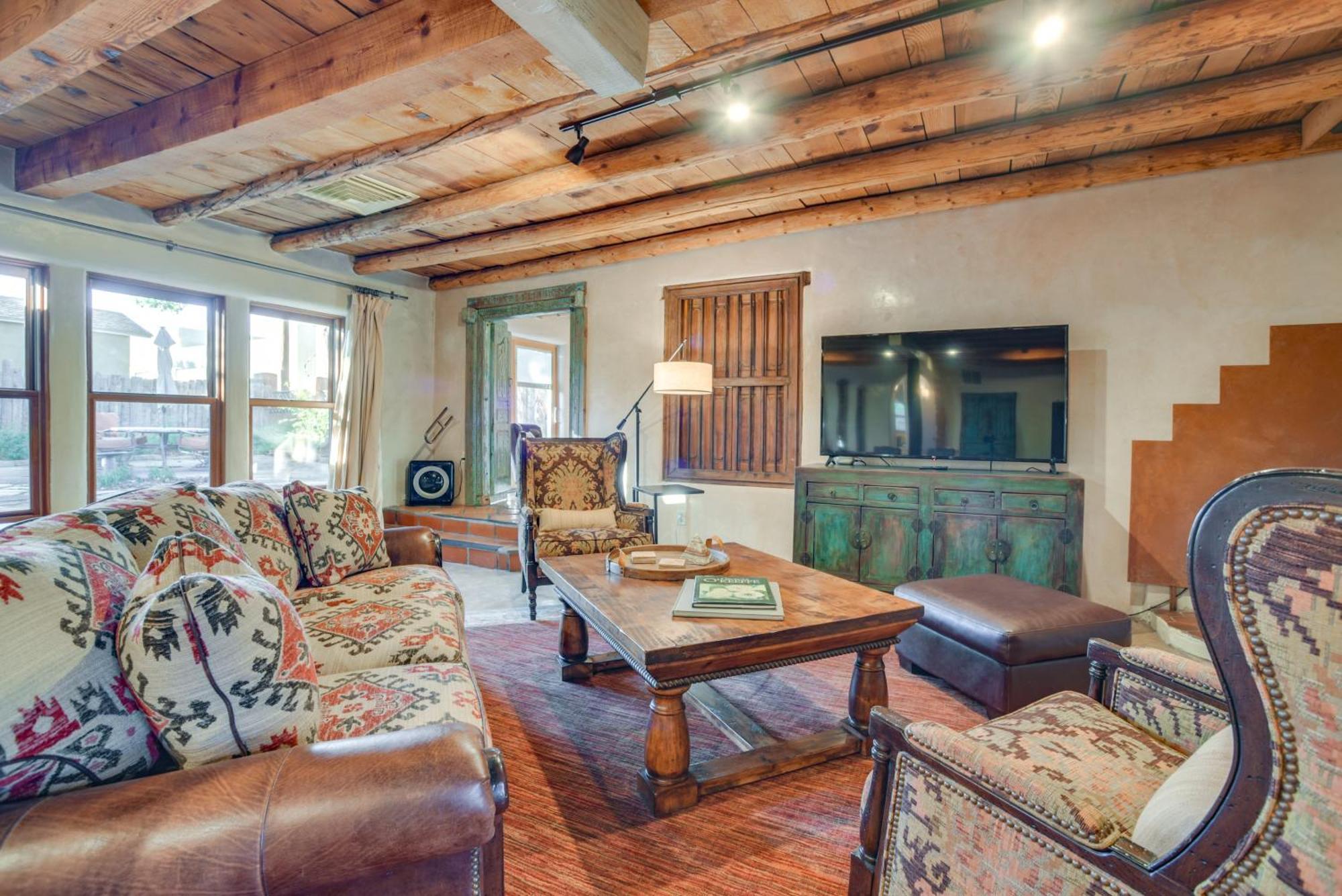 Rustic Adobe-style With Hot Tub In